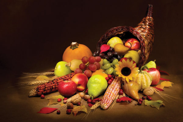 basket of fall fruits, vegetables and flowers