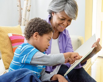 grandmother reading with grandson