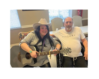 Irivne Nursing and Rehab visitor to facility, Bethi Lewis, musician.